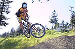 photo of mark crossing it up, mountain biking