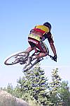 photo of mark getting air, mountain biking,
