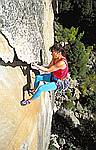 Sue crankiing out the undercling on Crimson Cringe, Merced River canyon, yosemite national Park.
